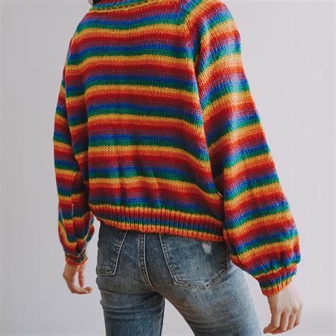 rainbow colored sweater.